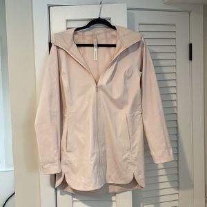 Light pink Lululemon rain jacket